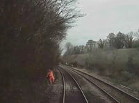 Rail worker in 'near miss' with train