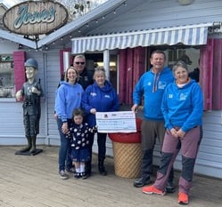 Charities receive Bovey Santa Dash dosh