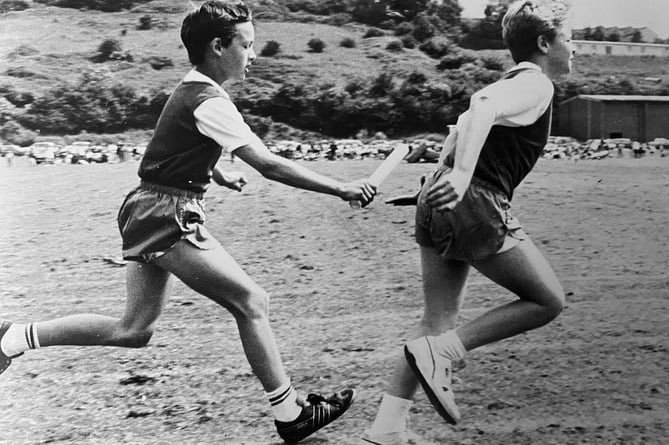 Roman Catholic Primary School Sports Day at Teignmouth's Broadmeadow Sports Centre on  June 10, 1989. Our Lady and St Patrick pupil Nigel Fraser (11) hands over the baton to team mate Glenn Fogden (11)  during one of the relay races.