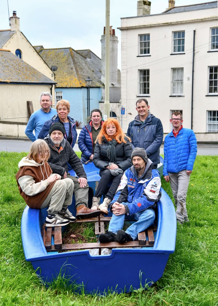 Volunteers are angry and upset after Devon Highways demand their boat planters be removed.