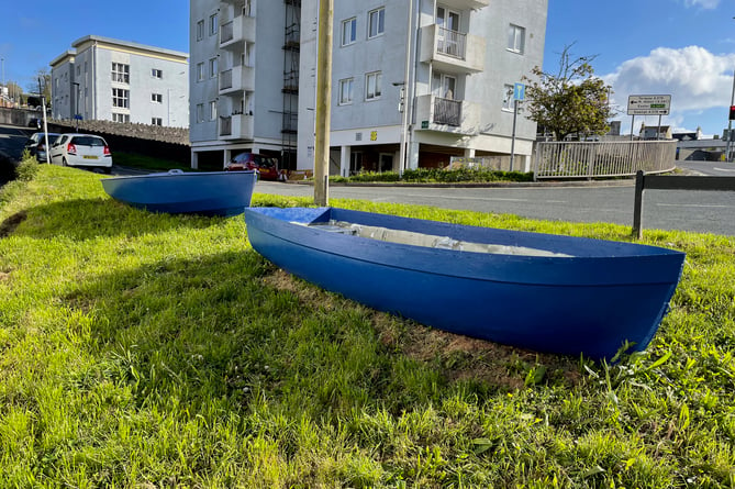 Boats on the grass verge on Parson Street Teignmouth