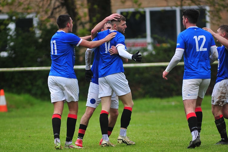 South West Peninsula League Premier East. Honiton Town versus Newton Abbot Spurs. A goal in the dying minutes of the game earned Spurs a 5-4 win over the Hippos