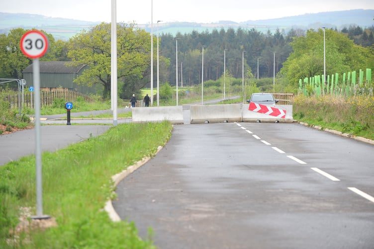 On the road to nowhere. The completed, but as yet unopened, Houghton Barton Link off the A382 near Newton Abbot