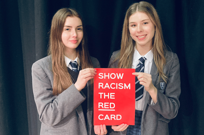 Kate and Imogen from Coombeshead Academy wrote the song that won the national Show Racism The Red Card Awards