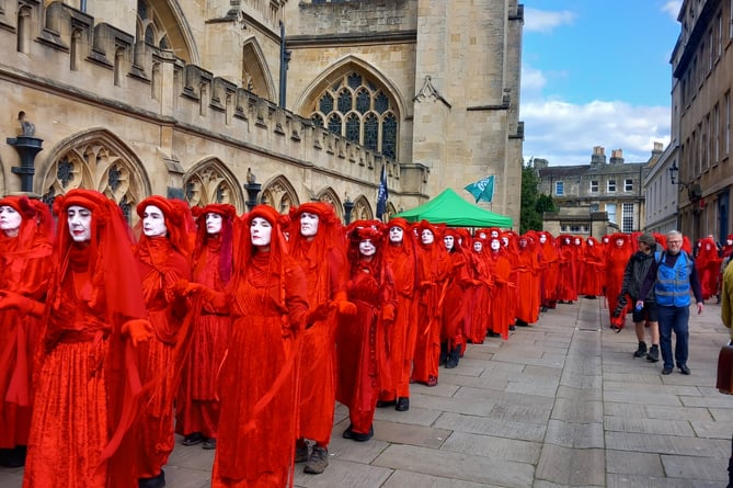 Red Rebels lead the 'Funeral for the Environment' procession