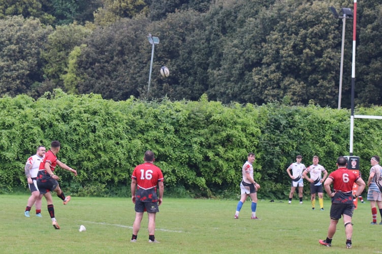 Frankie Dart kicks the winning penalty