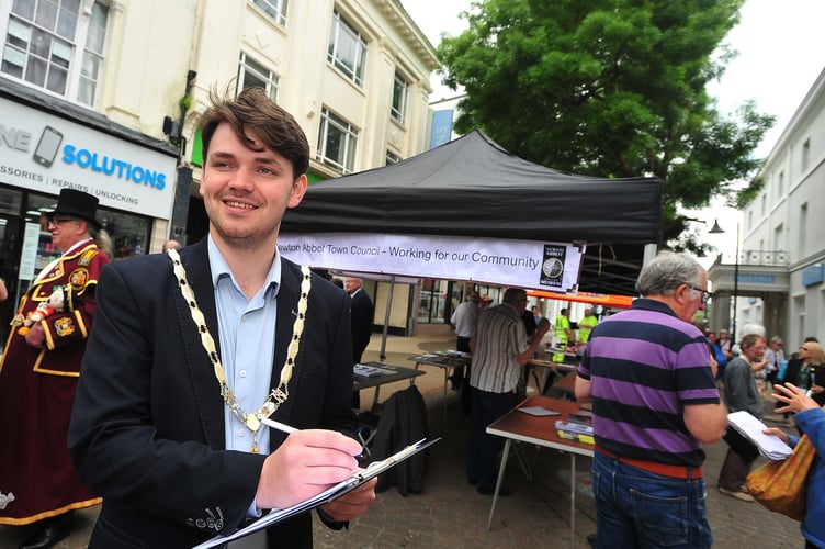 Newton Abbot Town Council town meeting. Newly elected mayor Cllr Alex Hall was waiting to hear people's views and suggestions.