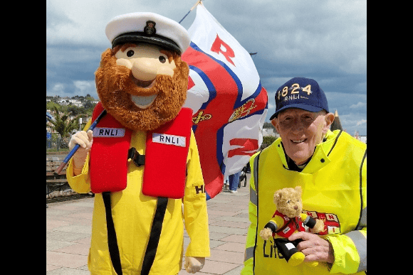 RNLI mascot Stan accompanies Marcus Braybrook on his mile a day