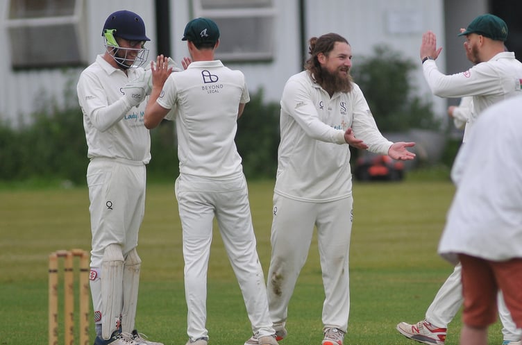 Devon Cricket League E Division West Teignmouth & Shaldon 2nd XI versus Tavistock 2nd XI. Teignmouth and Shaldon players celebrate the departure of Tavi's Tony Bicknell from the crease.