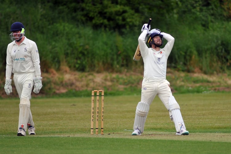 Devon Cricket League E Division West  Teignmouth & Shaldon 2nd XI  versus Tavistock  2nd XI. Frustration for Tavi's Tony Bicknell after he's caught out - T&S 'keeper Chris Partridge  finds it amusing 'though.