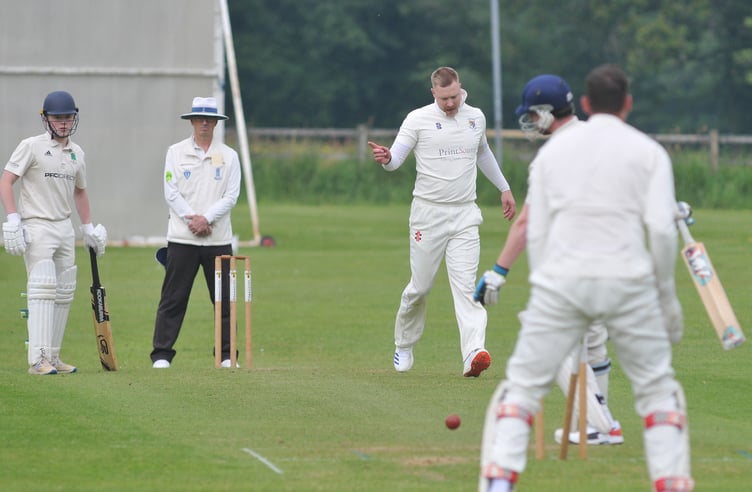Devon Cricket League B Division.   Chudleigh versus Barton. Chudleigh's George House takes the wicket of Callum Crocker