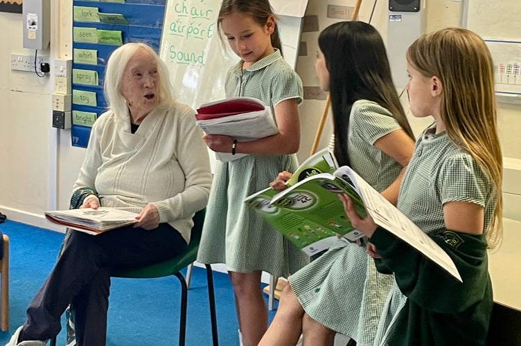 OLSP students share their learning with Joan