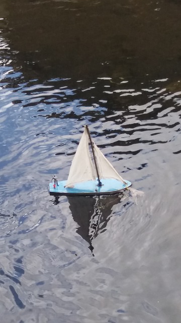 Toy boat on the water