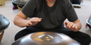 Children learn to bang the drum 