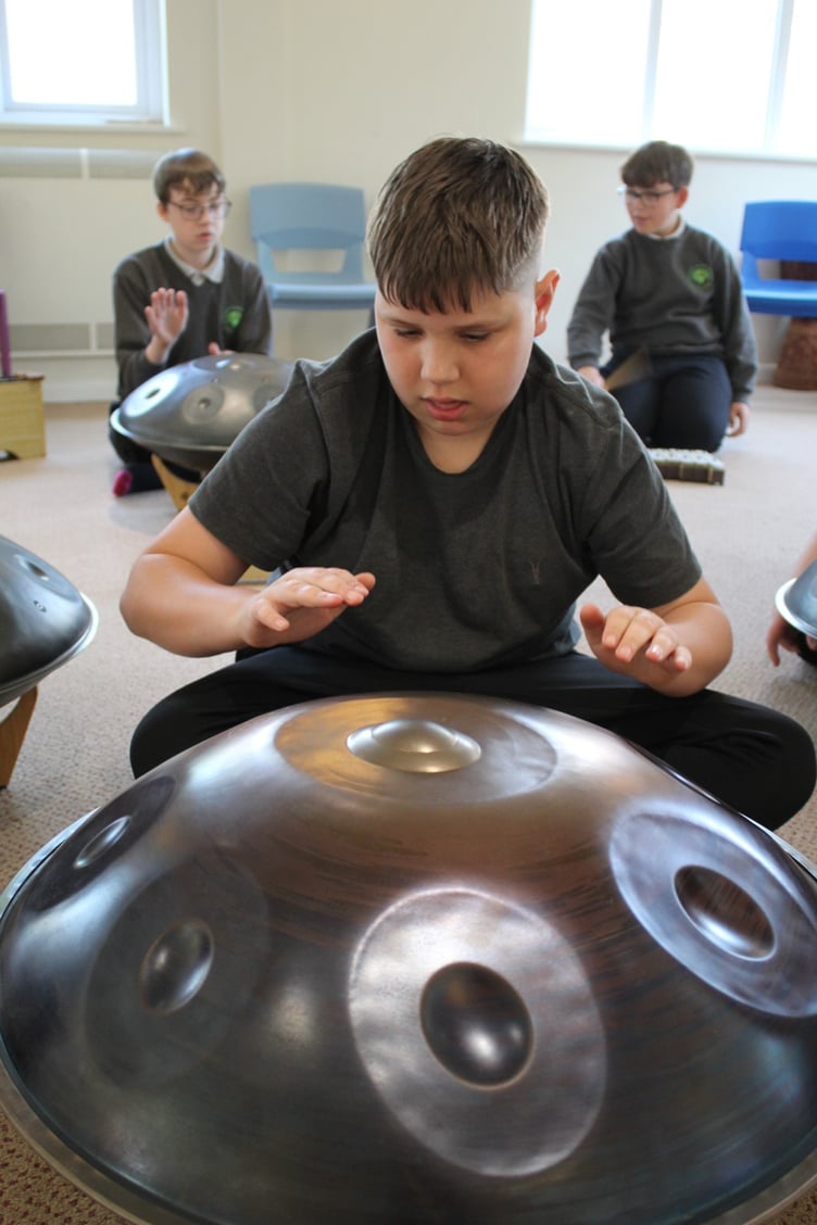 Youngsters bang the drum at Orchard Manor school