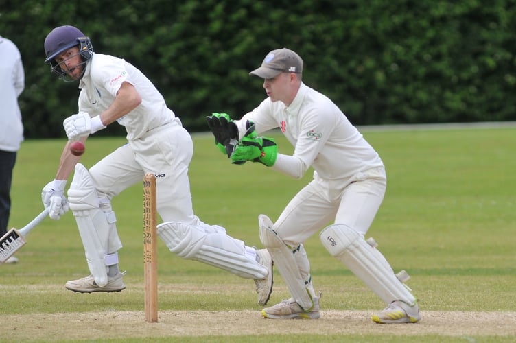 Devon Cricket League C Division West.  Ashburton versus South Devon, Ashburton started the batting after winning the toss and put up 254 for 7 over the 45 overs, while South Devon made 136 all out after 33.4 overs giving the homeside a 118 run win. Close run thing for Ash Berry as he makes the crease with South Devon 'keeper J Evans ready for the ball