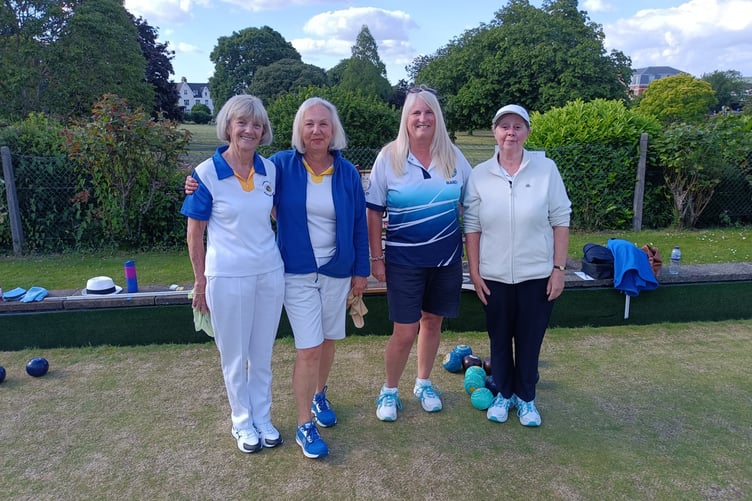 Newton Abbot duo Mandy Holtby and Catherine Pickett on the right, alongside their opponents