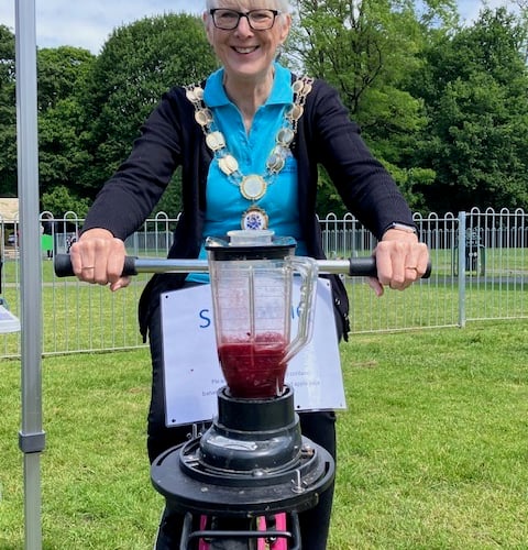 Bovey Tracey Mayor Councillor Sheila Brooke pedals her way to a delicious smoothie at the GBGW Festival