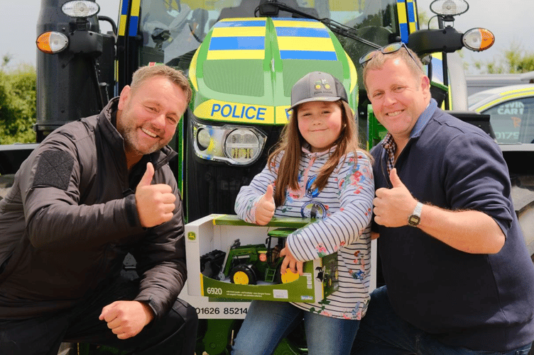 PC Clarke Orchard with winner Eloise Bettison and dad David