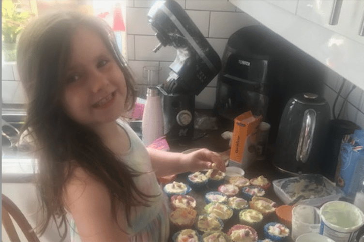 Red behind the scenes from a previous year's cake sale