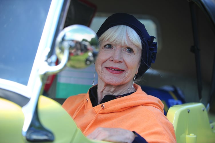 Back to the 1940s weekend with the South Devon Railway at Buckfastleigh. Maxine Millman from Bovey Tracey arriving in syle in a primrose yellow Austin 8 Tourer from 1946