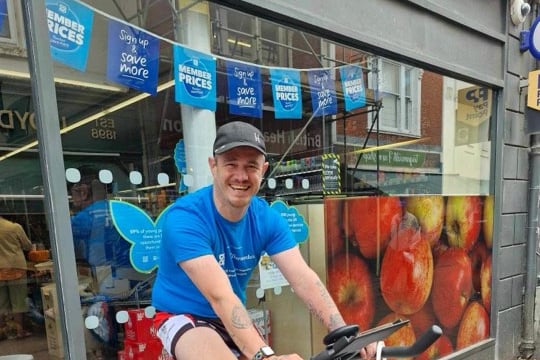 Ryan Hallett spinathon outside Teignmouth Co-op