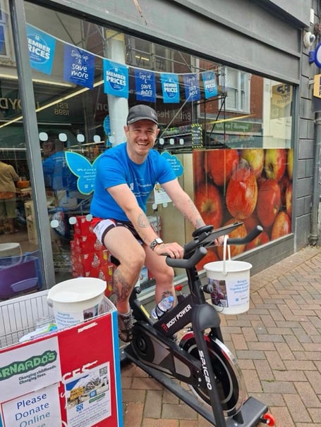 Ryan Hallett spinathon outside Teignmouth Co-op