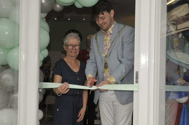 Cutting the ribbon at Mrs B's Bonnets