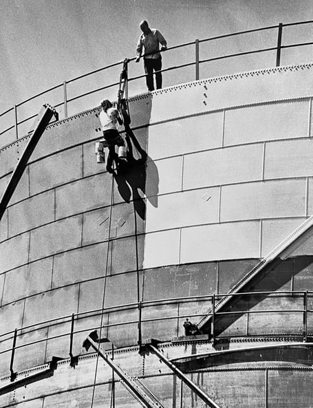 Archive Similar to painting the Forth Bridge  - workers painting one of Newton Abbot's gasometers in August 1973