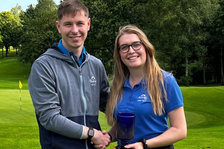 Brad Sercombe presents Charlotte Husband with her Club Championships trophy
