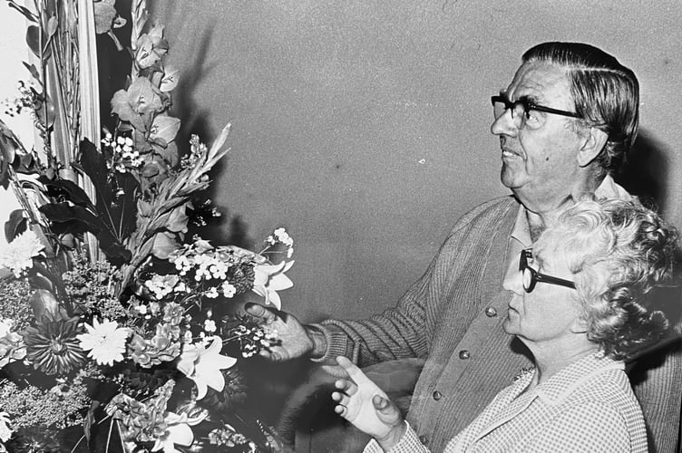 Festival of Flowers at Teignmouth Methodist Church in August 1973. Mr and Mrs P H Baker from Shaldon enjoy the displays