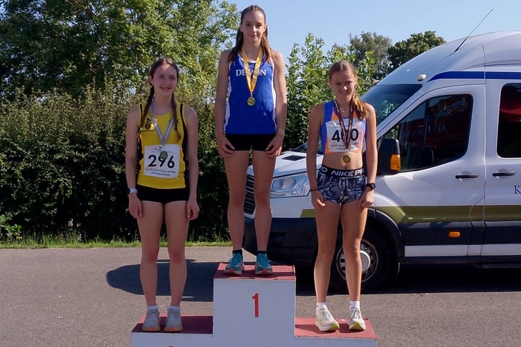 Olivia Steer on top of the podium in Exeter