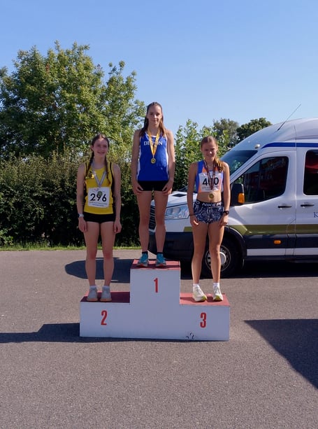 Olivia Steer on top of the podium in Exeter