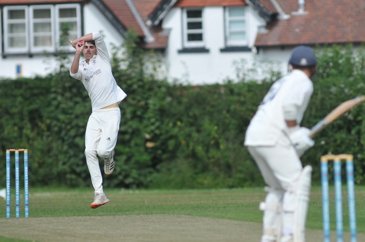 Devon Cricket League B  Division. Bovey Tracey 2nd XI versus Bideford/Littleham/Westward Ho! CC Saturday 1st XI. Bovey bowler Jack Ansley lines up on Jack Ford