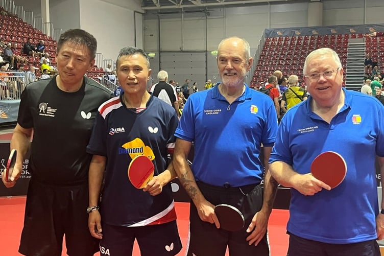 Dennis Gibbs and Terry Parkins with their last eight opponents from China