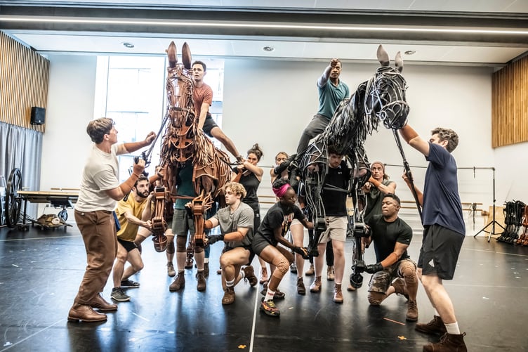 The cast of War Horse in rehearsals. Photo: Pamela Raith Photography.