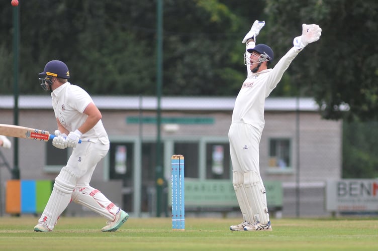 Devon Cricket League Premieer  Division.   Bovey Tracey versus Exeter. Bovey 'keeper Sam Taylor delighted as Exeter's Sam Read is taken for lbw by Musa Twala