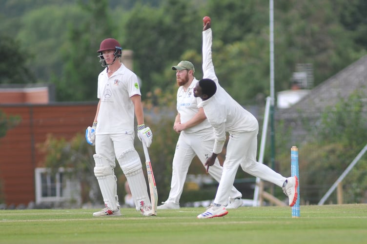 Devon Cricket League Premieer  Division.   Bovey Tracey versus Exeter. Bovey bowler Musa Twala
