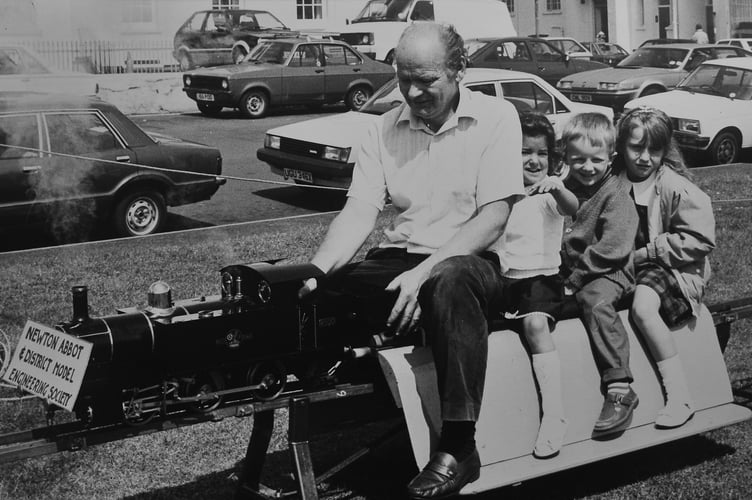 All aboard the Inverteign Express. Youngsters from Teignmouth's Inverteign School take a trip courtesy of Newton Abbot and District Model Engineering Society at their annual fete on The Den in June 1988