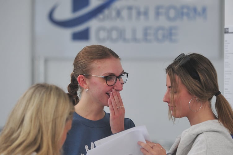 A-Level results day at Teign School, Kingsteignton.  Moment of truth as the envelopes are opened