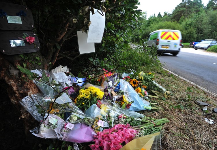 Floral tributes left at the site on the unclassfied road linking Haldon Hill and Telegraph Hill where two teenagers died following a single vehicle RTC on August 8