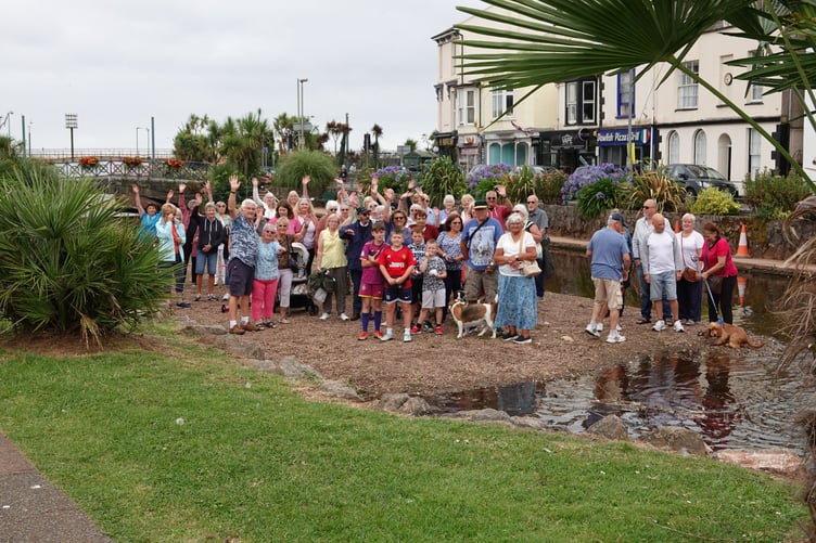 Campaigners standing on the new 'beach' - once the Dawlish boating lake. Photo Bob Simpson