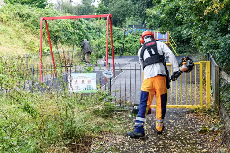 Volunteers work to make the Fourth Avenue play area in Teignmouth more accessible for children and families