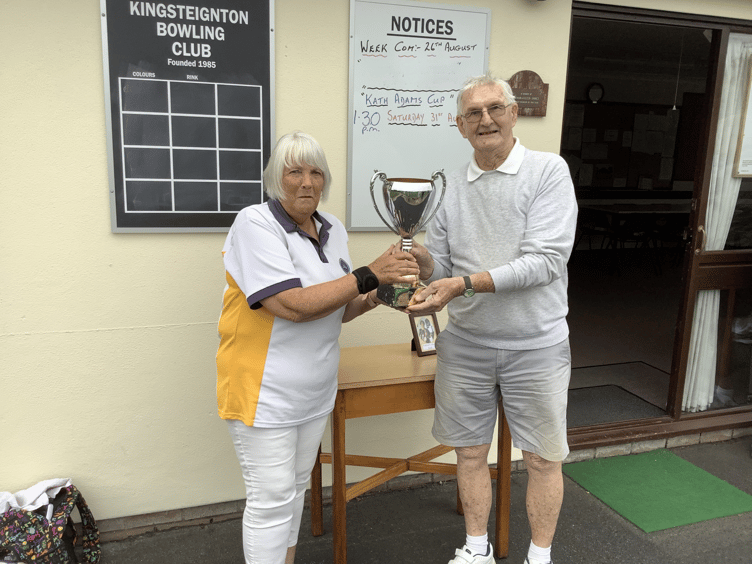 Margaret Sole is presented with the Kath Adams Trophy