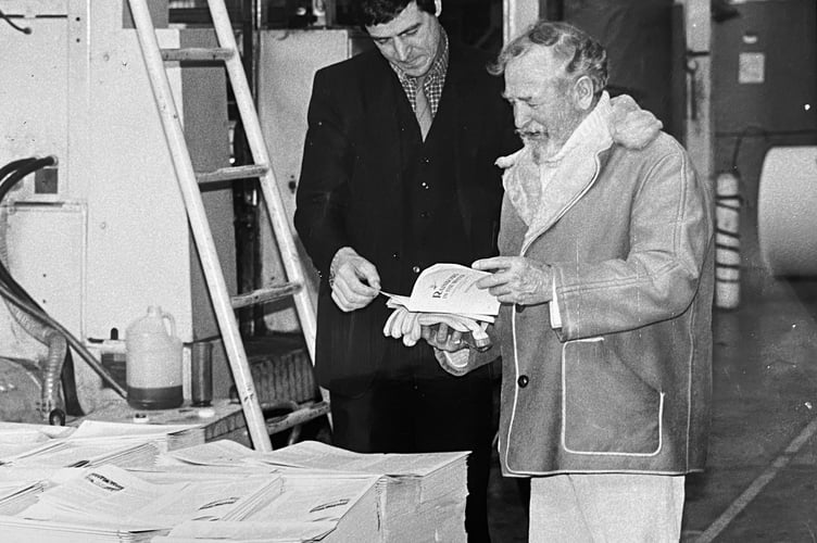 Hot off the press. Former Devon water-bailiff Bob Davison inspects first copies of his autobiography Rainbow In The Water with publishing manager Simon Butler at printers A Wheaton and Co. Ltd.
Bob's work included the wardenship of the huge reservoirs that stand above the Teign Valley.