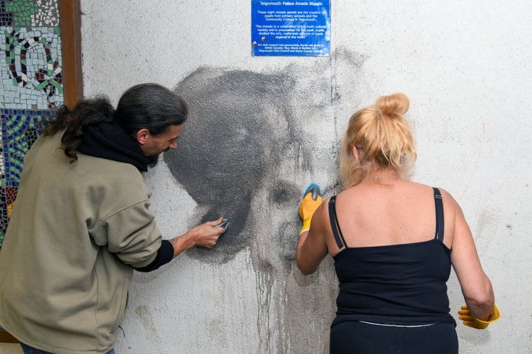 Cleaning up graffiti in Teignmouth