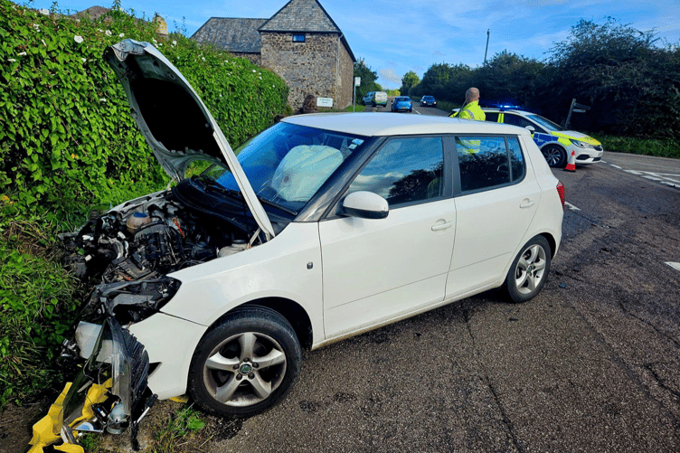 Two vehicles collide near Pridhamsleigh as firefighters provide first aid
