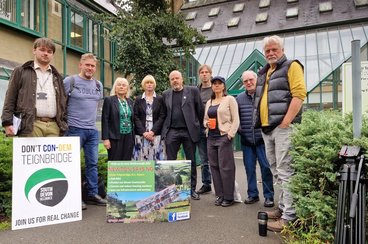 Protesters against the Wolborough development and councillors outside Teignbridge Council's Forde House headquarters (Image courtesy: Guy Henderson)