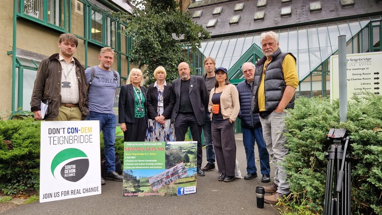 Protesters against the Wolborough development and councillors outside Teignbridge Council's Forde House headquarters (Image courtesy: Guy Henderson)
