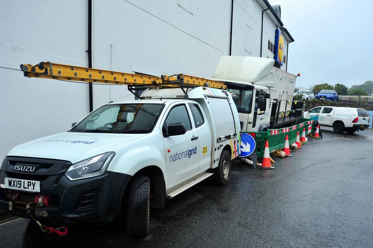 Generators providing electrical power in the centre of Teignmouth after a power outage affected hundreds of residential properties and businesses in the town 